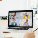 businesswoman-using-laptop-talk-to-colleagues-about-plan-in-video-call-meeting-while-working-from-home-at-living-room 2